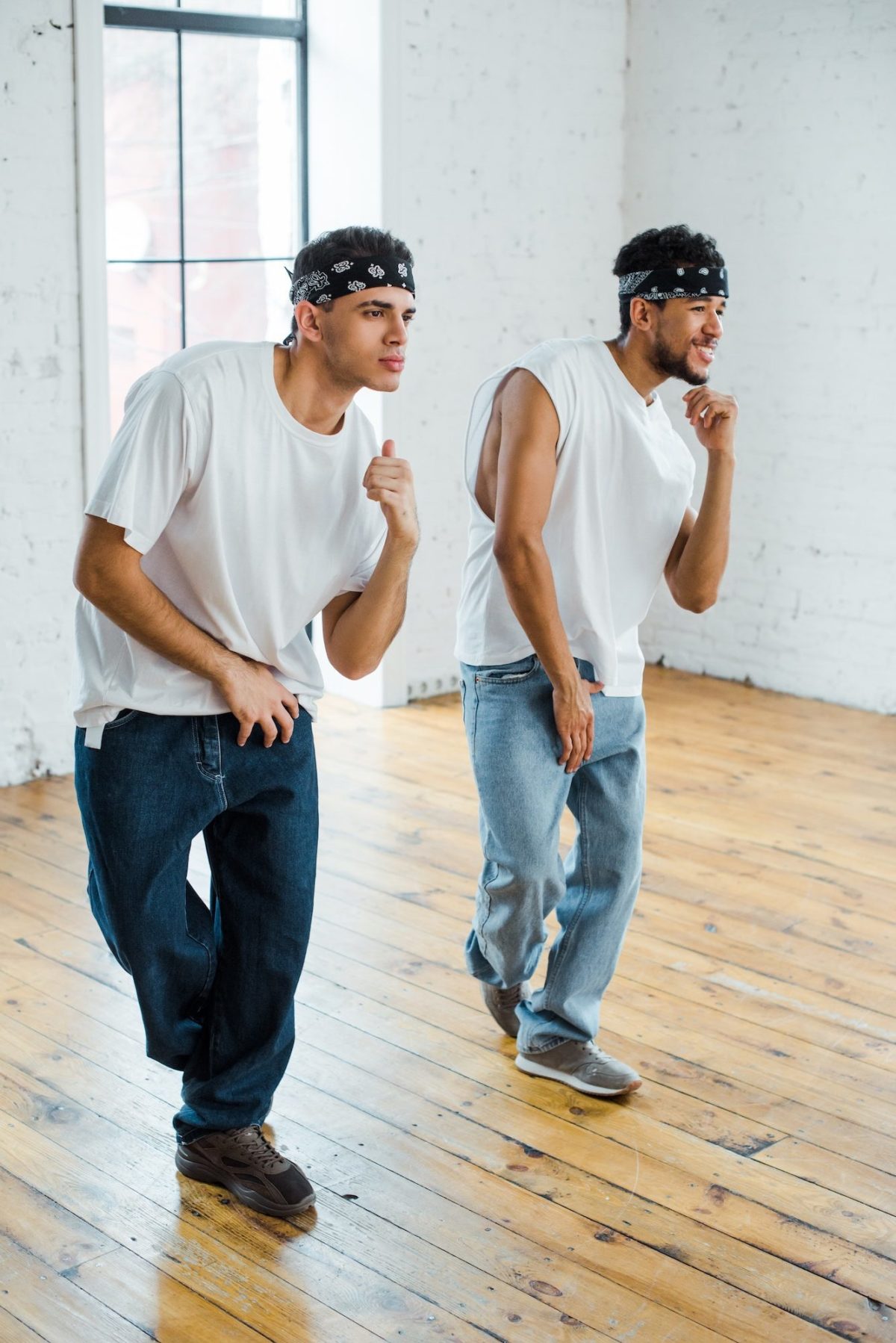 handsome-multicultural-dancers-in-headbands-dancing-hip-hop-e1684994207802.jpg